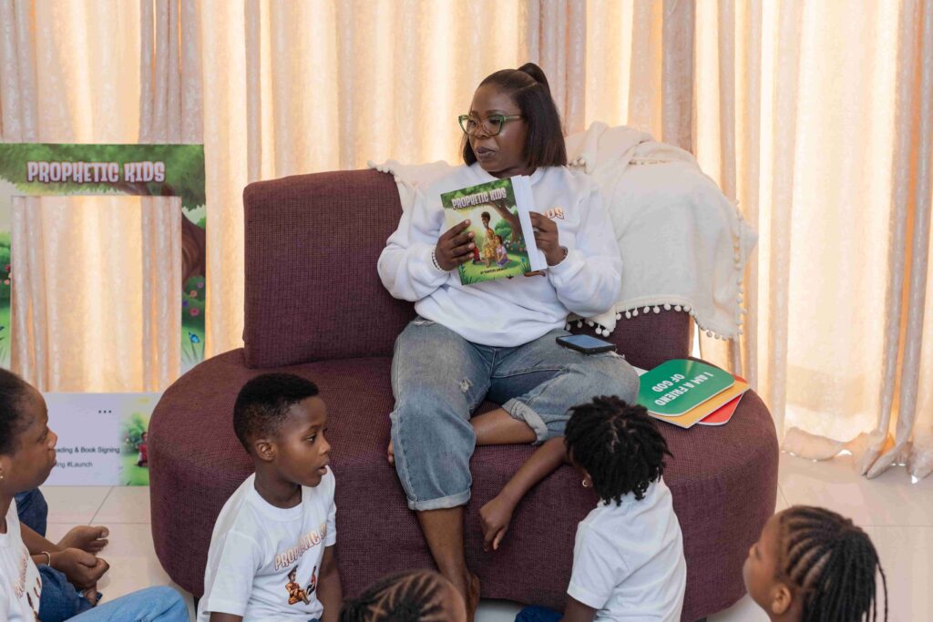 Temitope Adewuyi at book reading with the prophetic kids